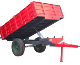 Harvesting Tractor Tipping Trailer